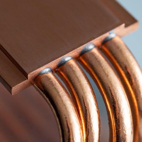 Copper heatsink for computer processors. Image Credit: Shutterstock.com/Wirestock Creators