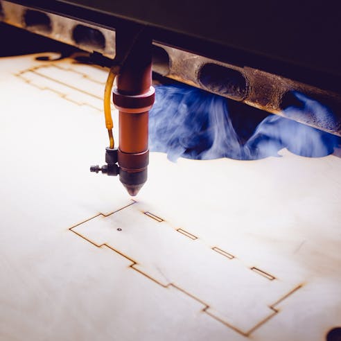 Wood laser cutting. Image Credit: Shutterstock.com/Parilov