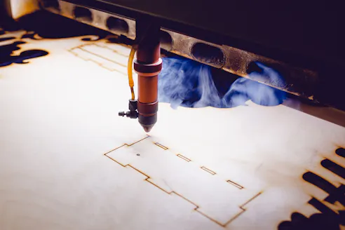 Wood laser cutting. Image Credit: Shutterstock.com/Parilov