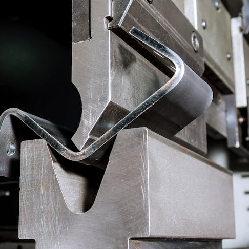 Bending sheet metal. Image Credit: Shutterstock.com/ZhakYaroslav