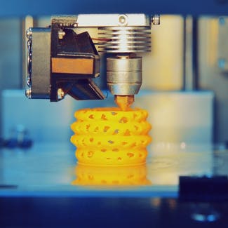 3D printed yellow object. Image Credit: Shutterstock.com/MarinaGrigorivna