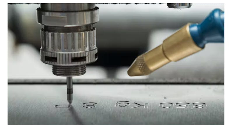 Machine engraving a metal part