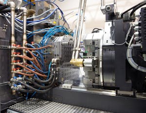 An injection molding machine. Image Credit: Moreno Soppelsa/Shutterstock