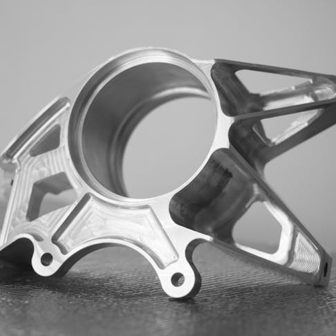 Aluminum suspension part. Image Credit: Shutterstock.com/Miroljub Miladinovic