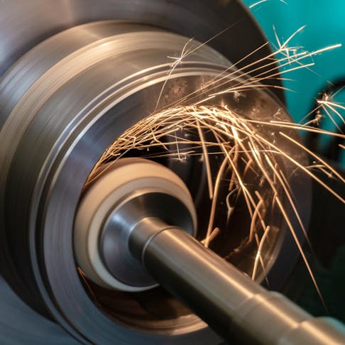 Grinding metal. Image Credit: Shutterstock.com/Dovzhykov Andriy
