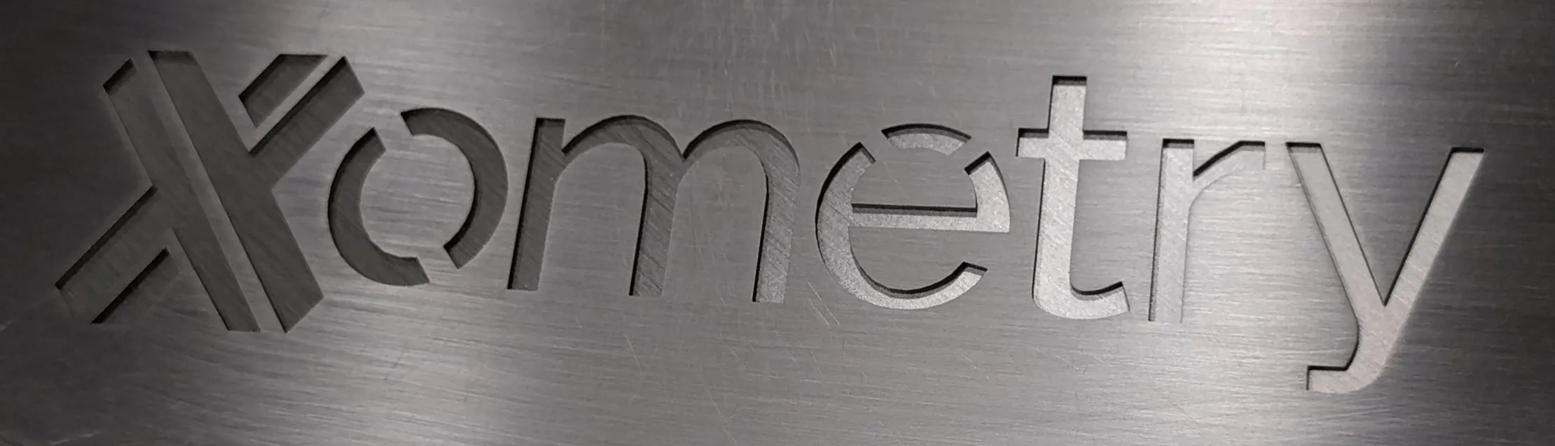An example of "stencilized" text on a sheet cut part.