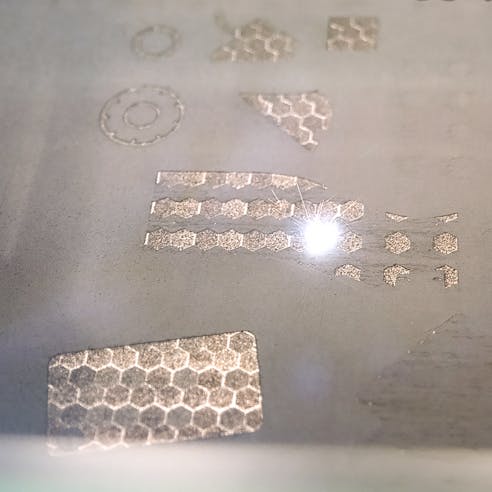 Parts being made in a DMLS machine