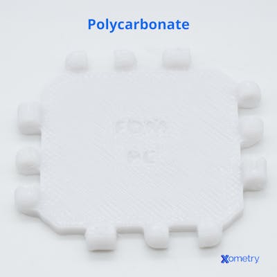 Polycarbonate 3D printed part made by Xometry