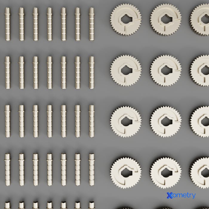 An array of various metal injection molded parts.