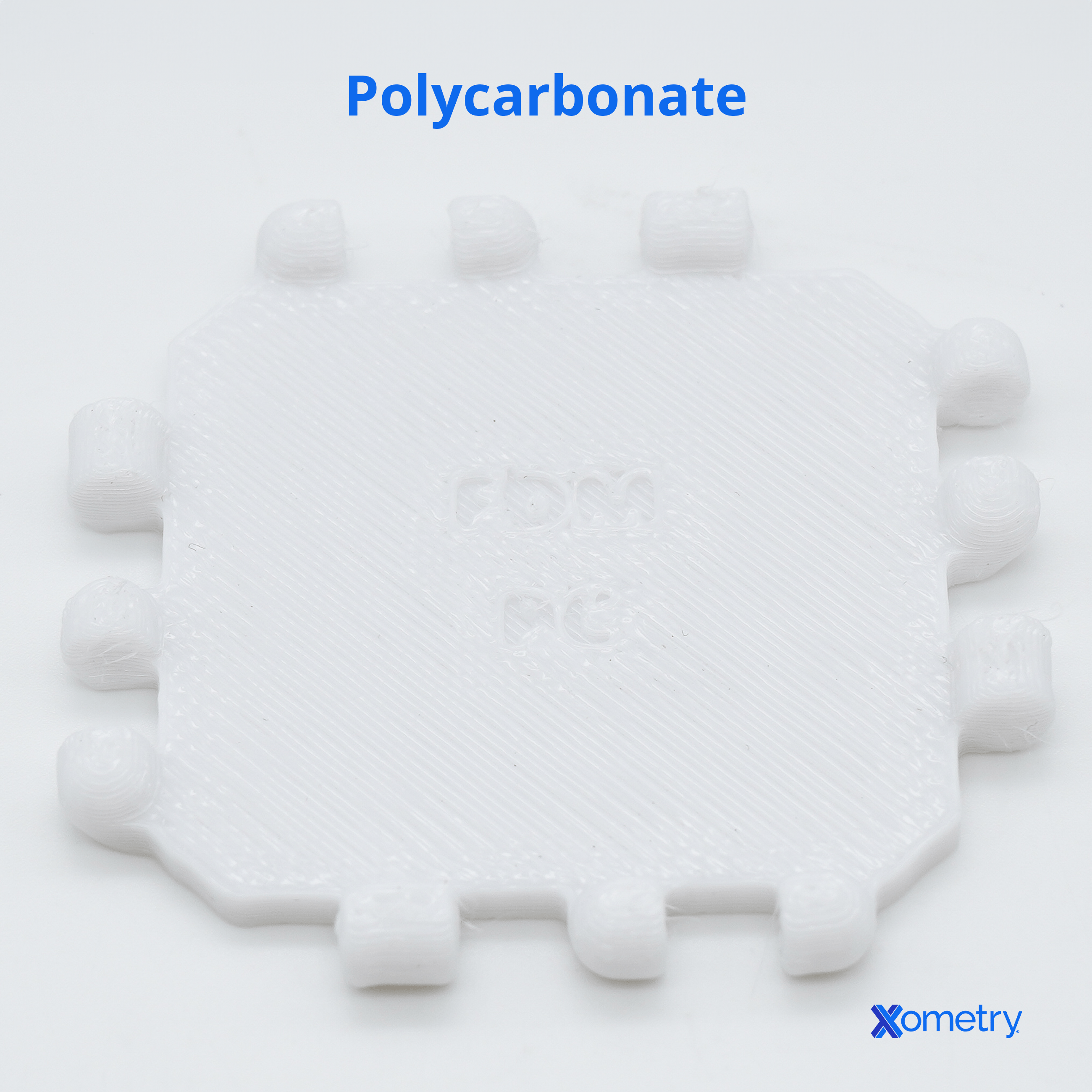 A sample of Xometry's polycarbonate material.