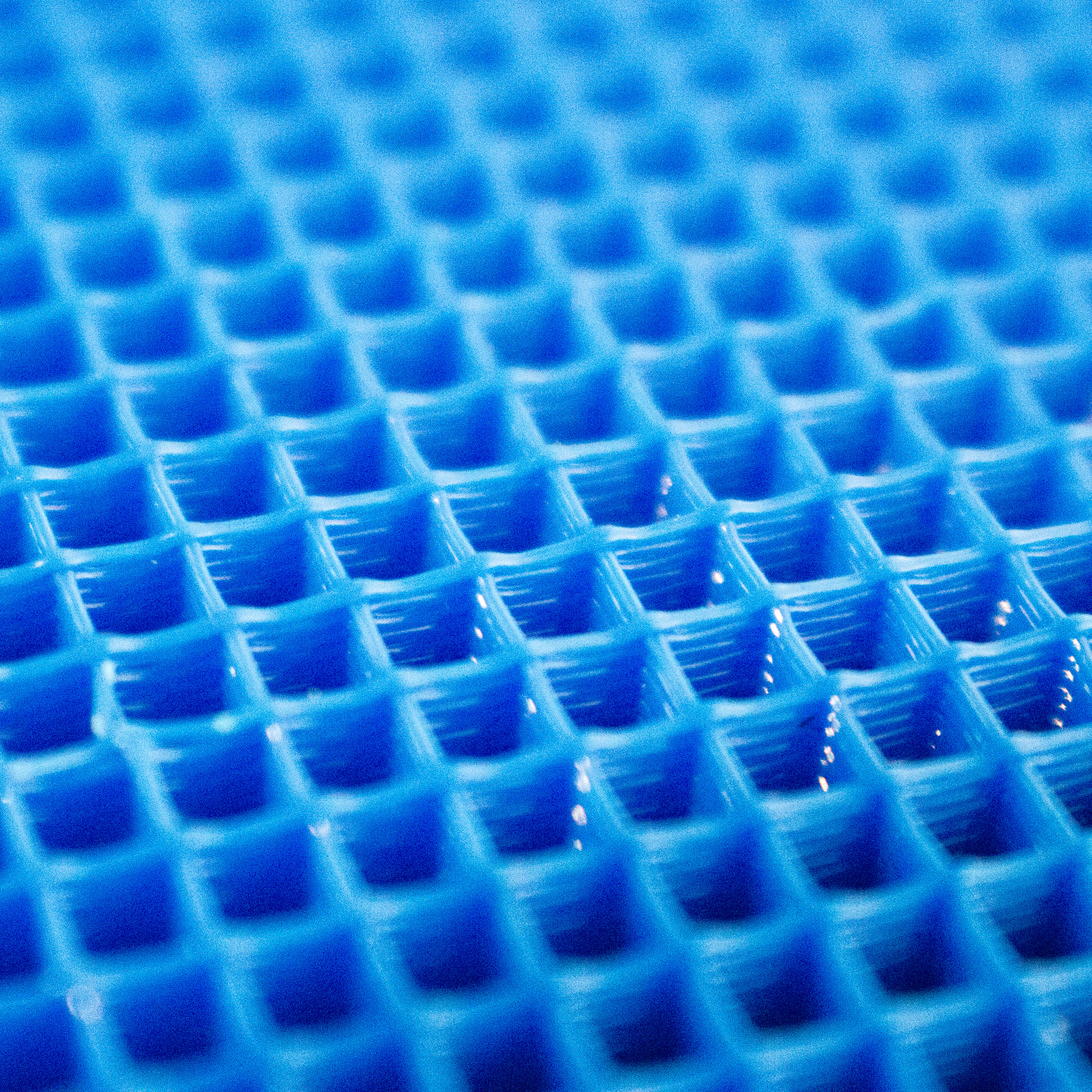 Close up image of the infill pattern of an FDM 3D print.