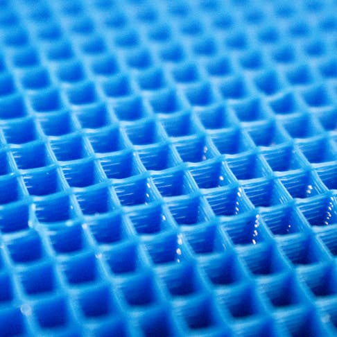 Close up image of the infill pattern of an FDM 3D print.