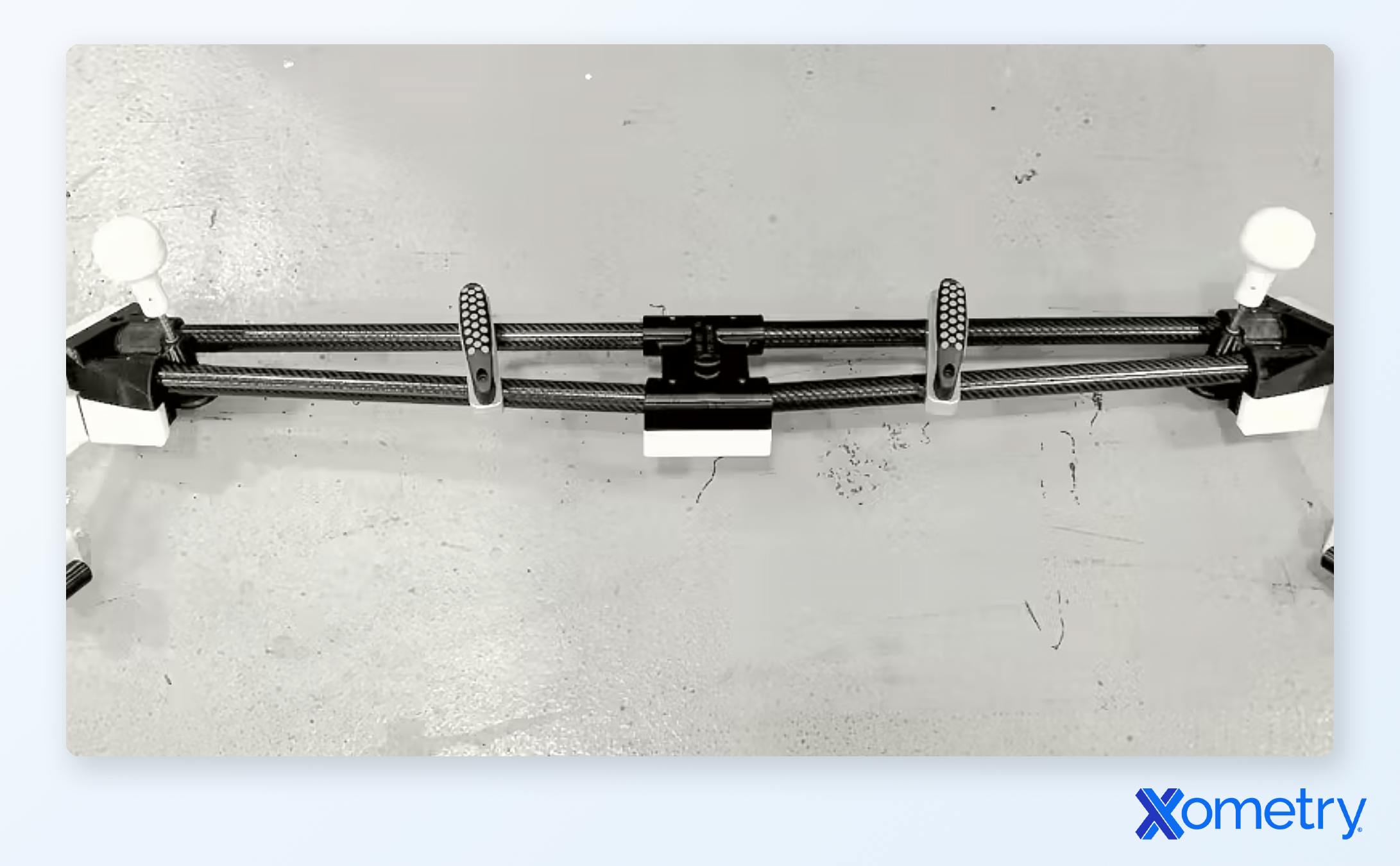 Xometry-manufactured fixture used for alignment of the vehicle back end. Contains cut carbon fiber tubing, CNC machined plastic and metal parts, and 3D printed Ultem components made by Xometry.