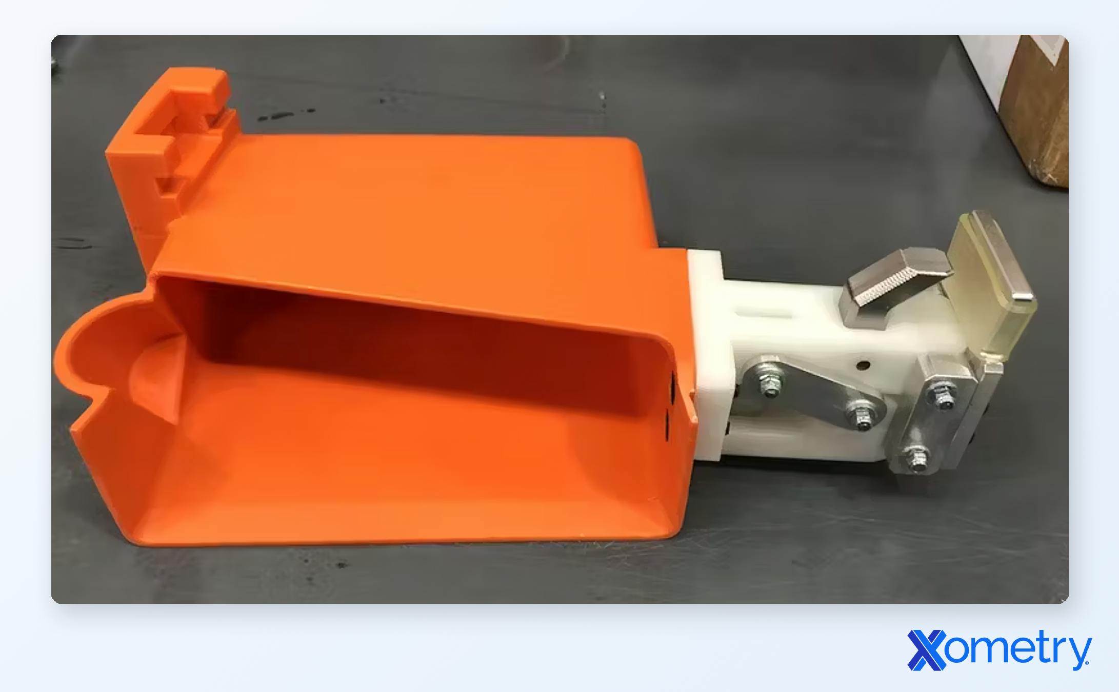 A Xometry-manufactured fixture used for the assembly of electrical components in hybrid electric vehicles. The assembly consists of a mix of urethane molded parts and CNC parts.