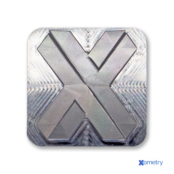 aluminum machined Xometry logo