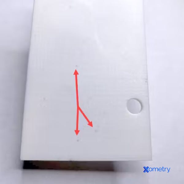 Example of speckling on a white part