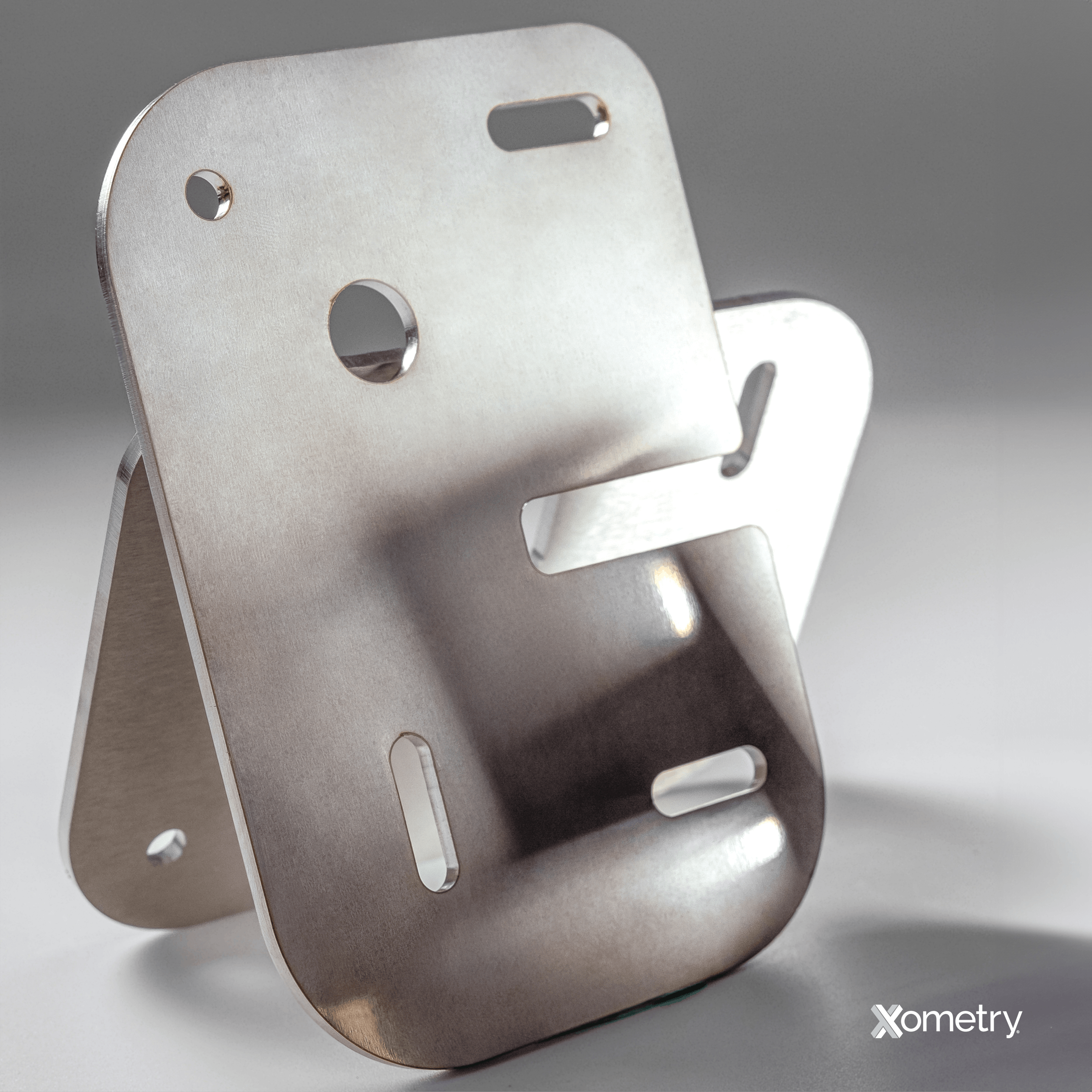 A stainless steel part made by Xometry