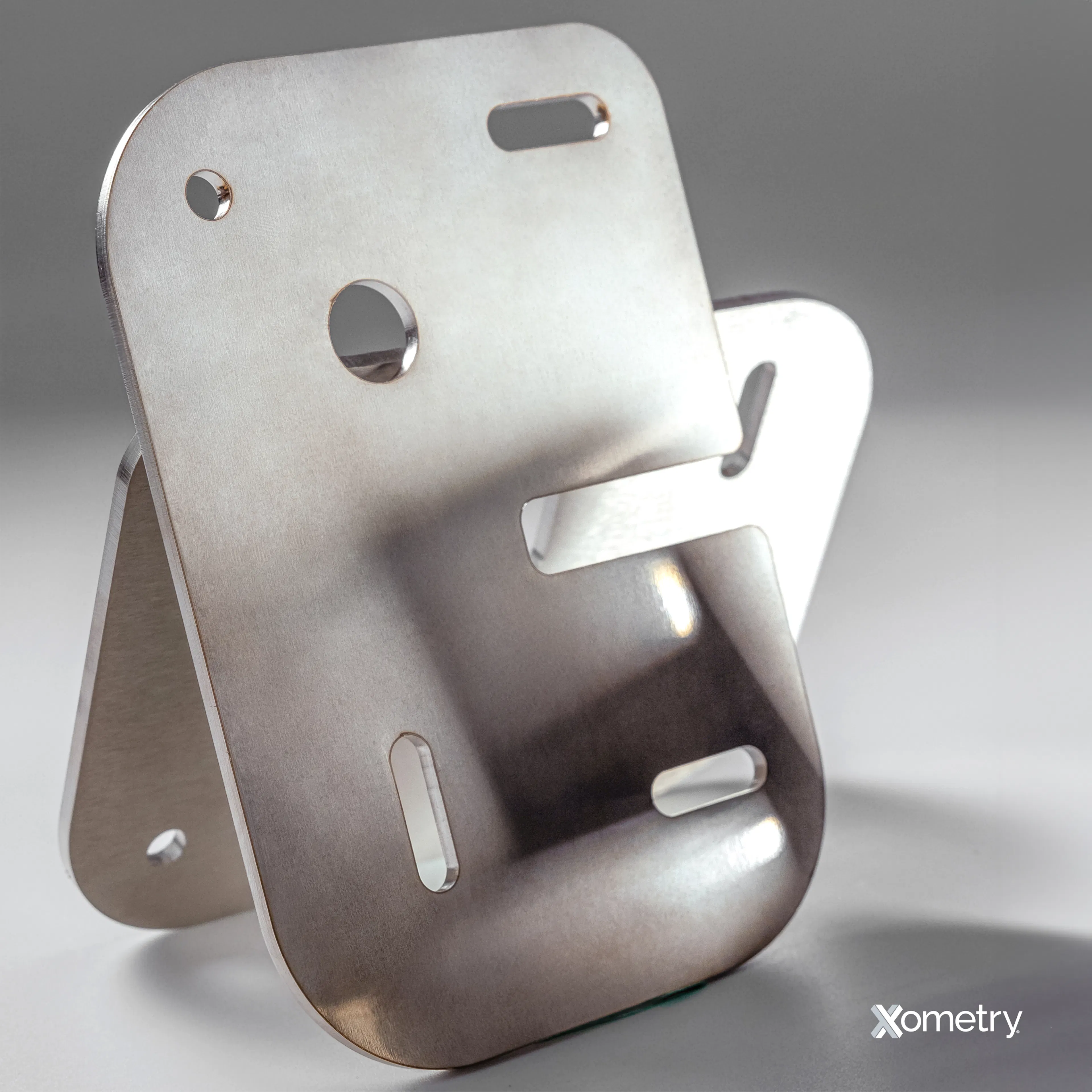 Stainless steel sheet cut parts made by Xometry