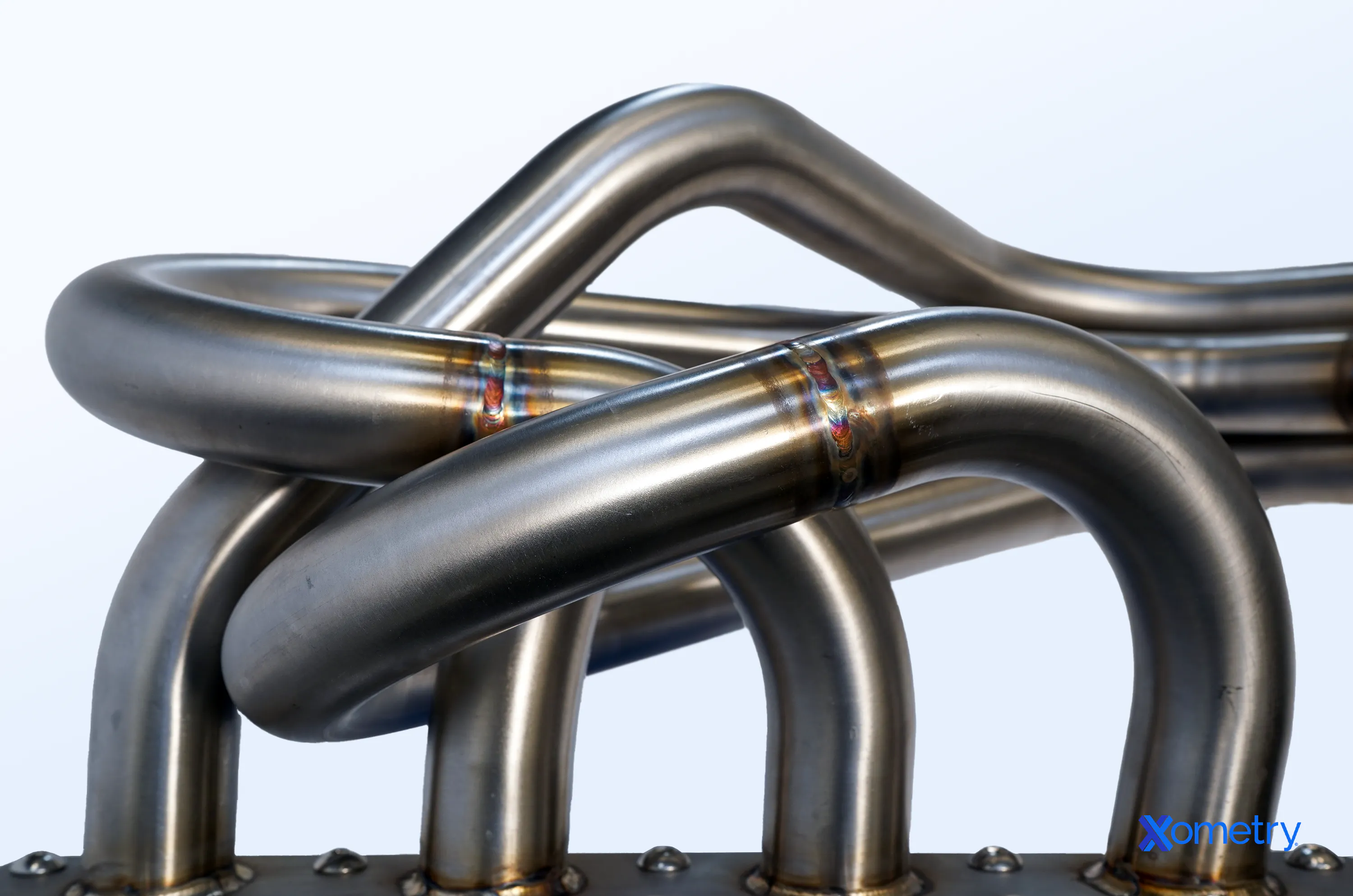 Stainless steel bent tube assembly by Xometry.