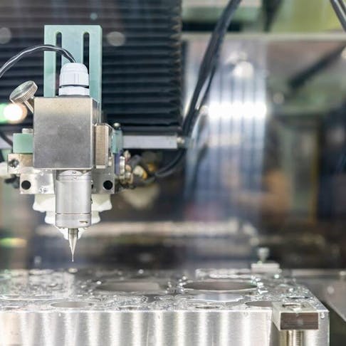 CNC EDM wire cut machine. Image Credit: Shutterstock.com/Surasak_Photo