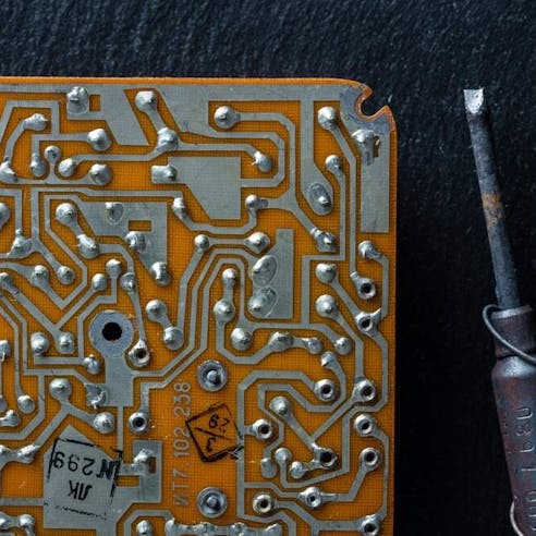 Old printed circuit board. Image Credit: Shutterstock.com/OlegD