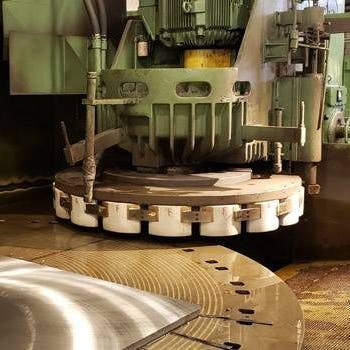 Blanchard grinding machine. Image Credit: https://langegrinding.com/equipments/blanchard-grinders/