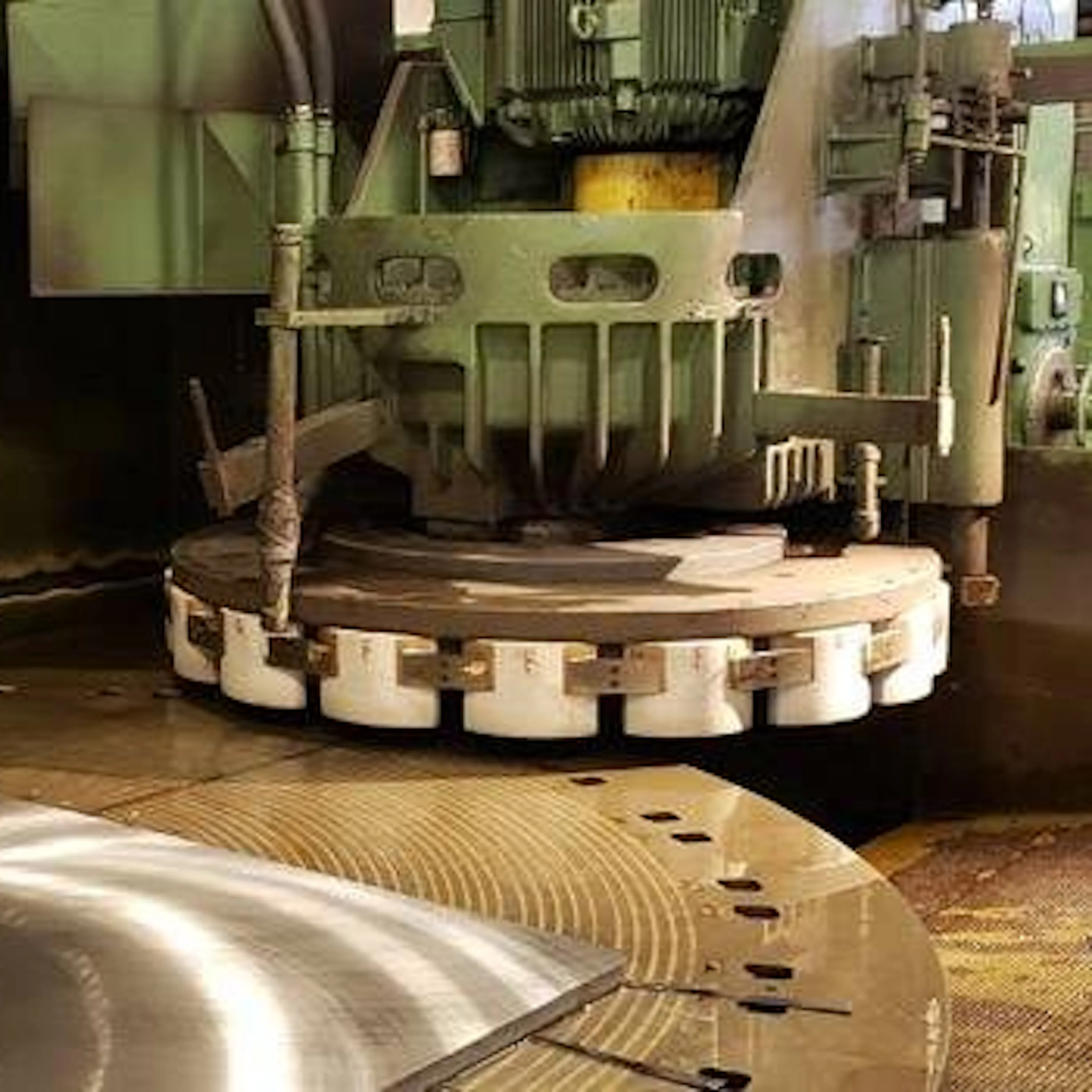 Blanchard grinding machine. Image Credit: https://langegrinding.com/equipments/blanchard-grinders/