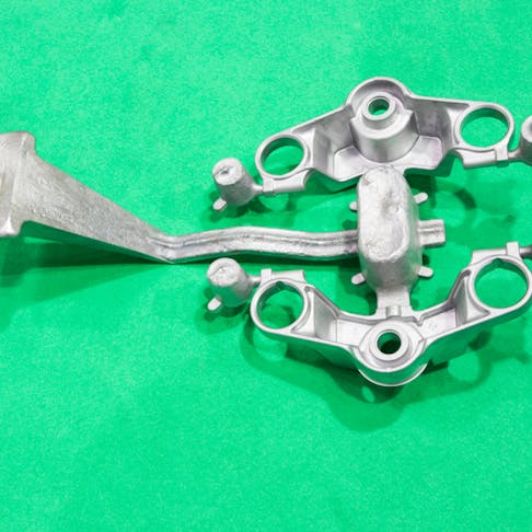 Permanent mold cast of motorcycle headstock. Image Credit: Shutterstock.com/Mr.1