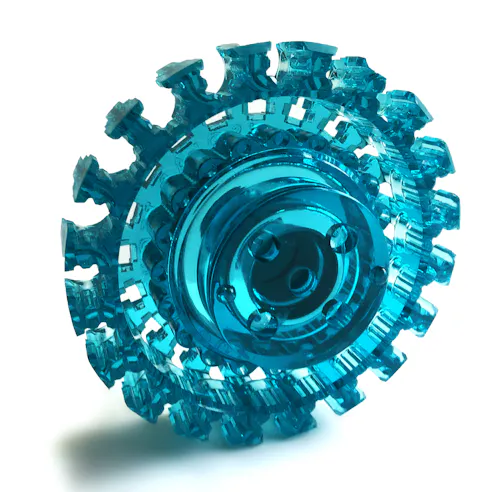 Teal transparent cast urethane part made by Xometry.