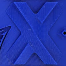 Close-up of a blue PLA part.