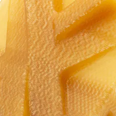 3D printed Xometry X-tile made of ULTEM 1010.