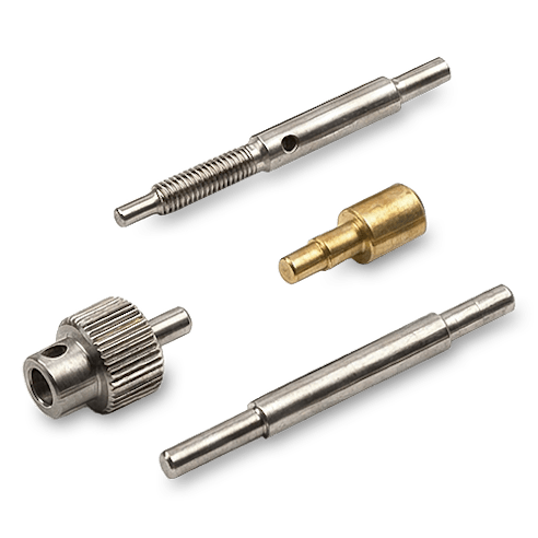 Various Swiss-machined components in different materials.