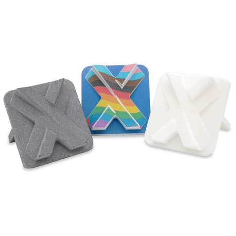 A group of MJF printed parts in different materials.