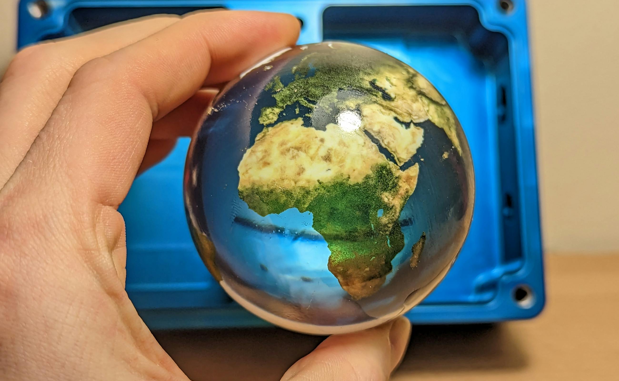 A full-color polyjet part after polishing and clear coating.