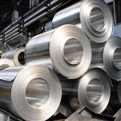 Rolls of aluminum sheets. Image Credit: Shutterstock.com/Yulia Grigoryeva