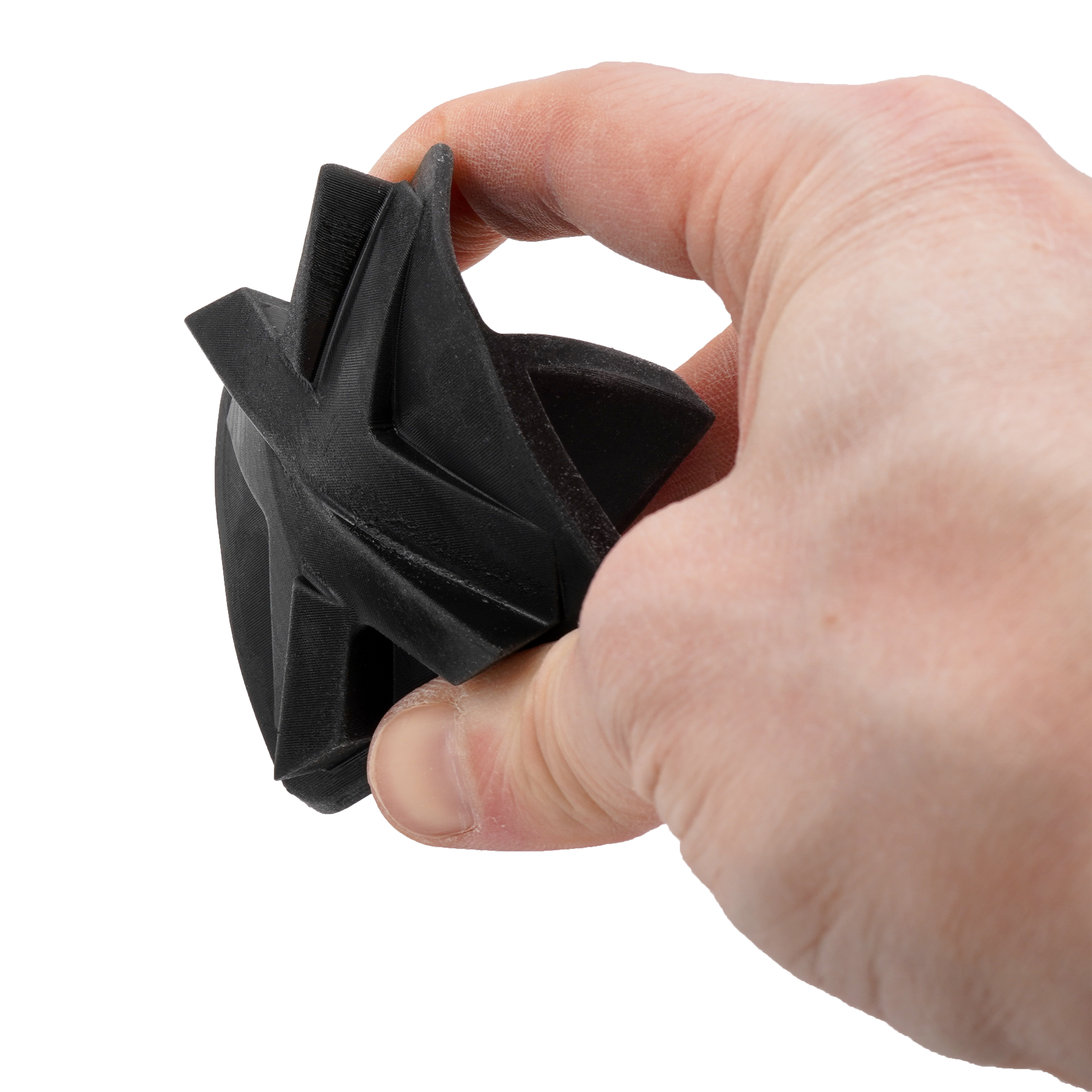 A 3D-printed EPU 41 part being compressed between fingers.