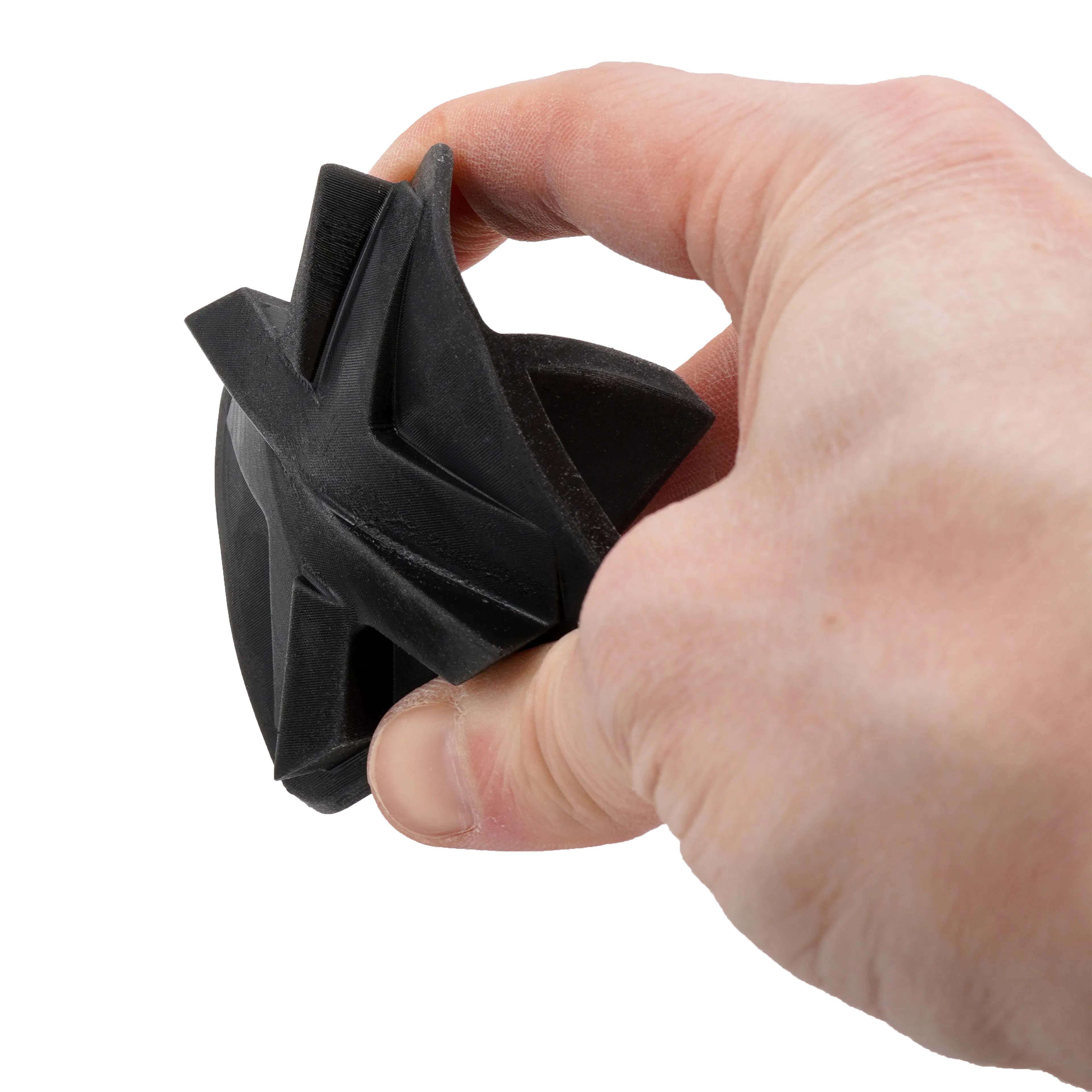 A 3D-printed EPU 41 part being compressed between fingers.