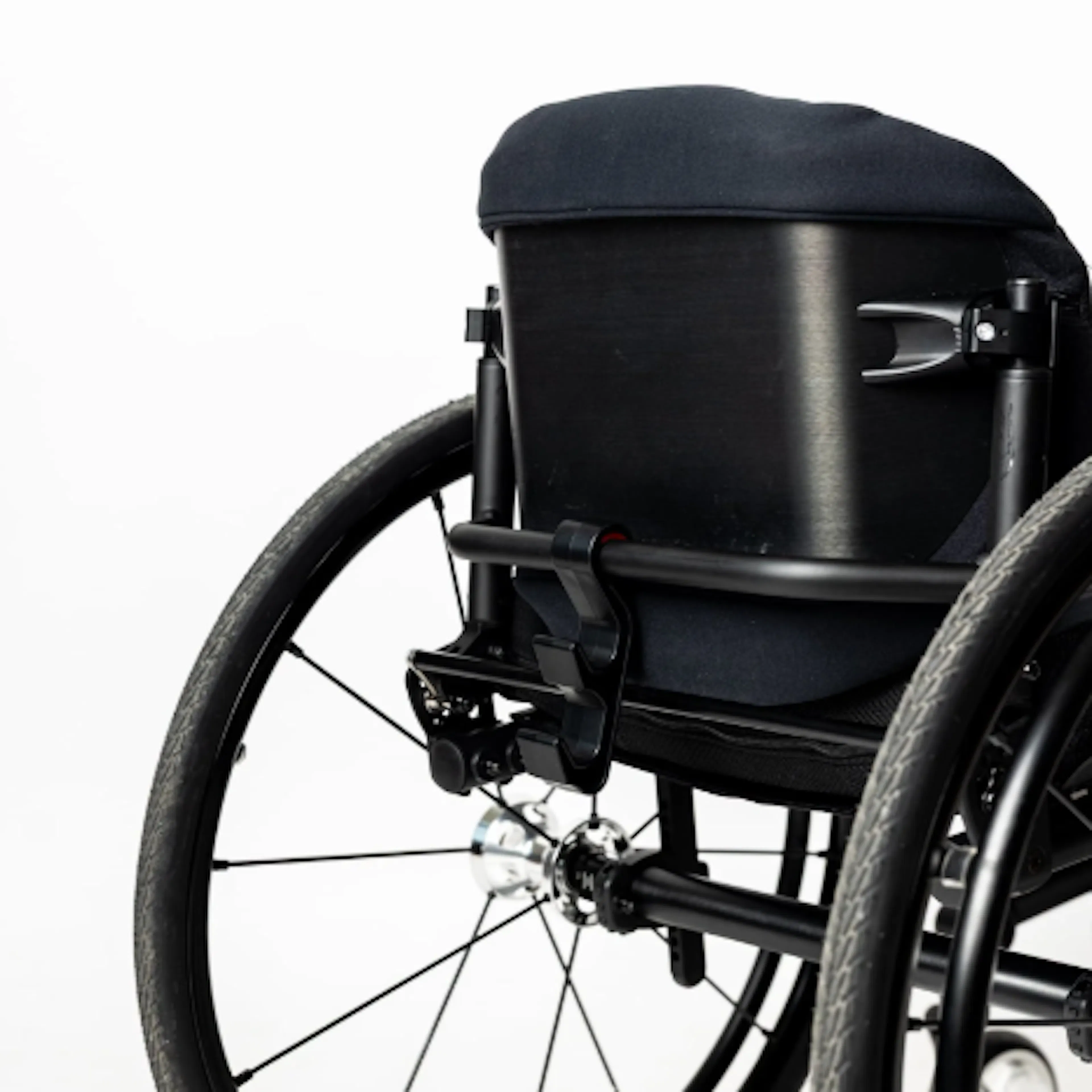 Xometry’s Injection Molding Service Helps Inventor Improve Daily Life for People With Disabilities [Image: Injection-molded Easy Hang hook on a wheelchair]
