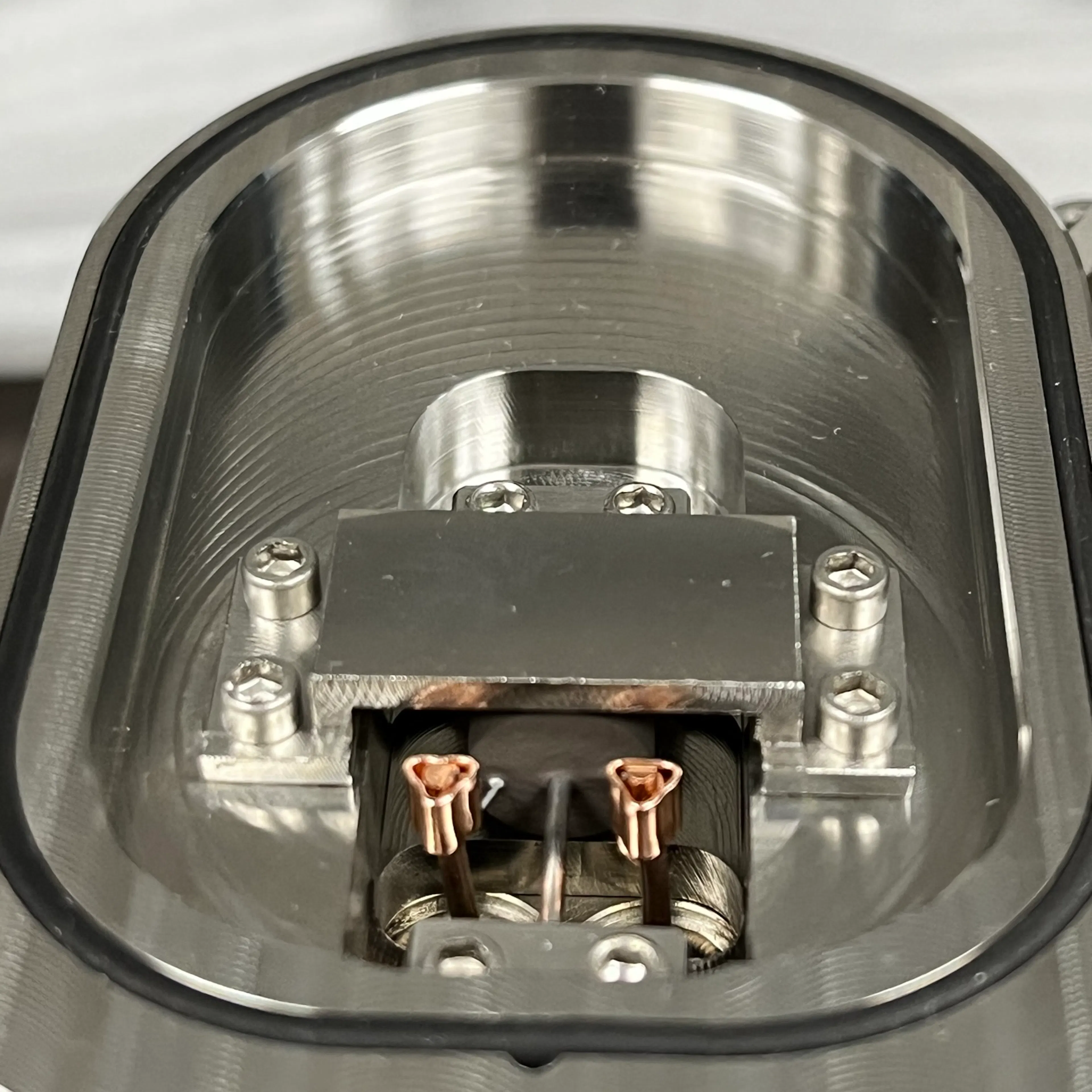 The completed ion gauge door plate UNH ordered from Xometry (Photo credit: UNH)
