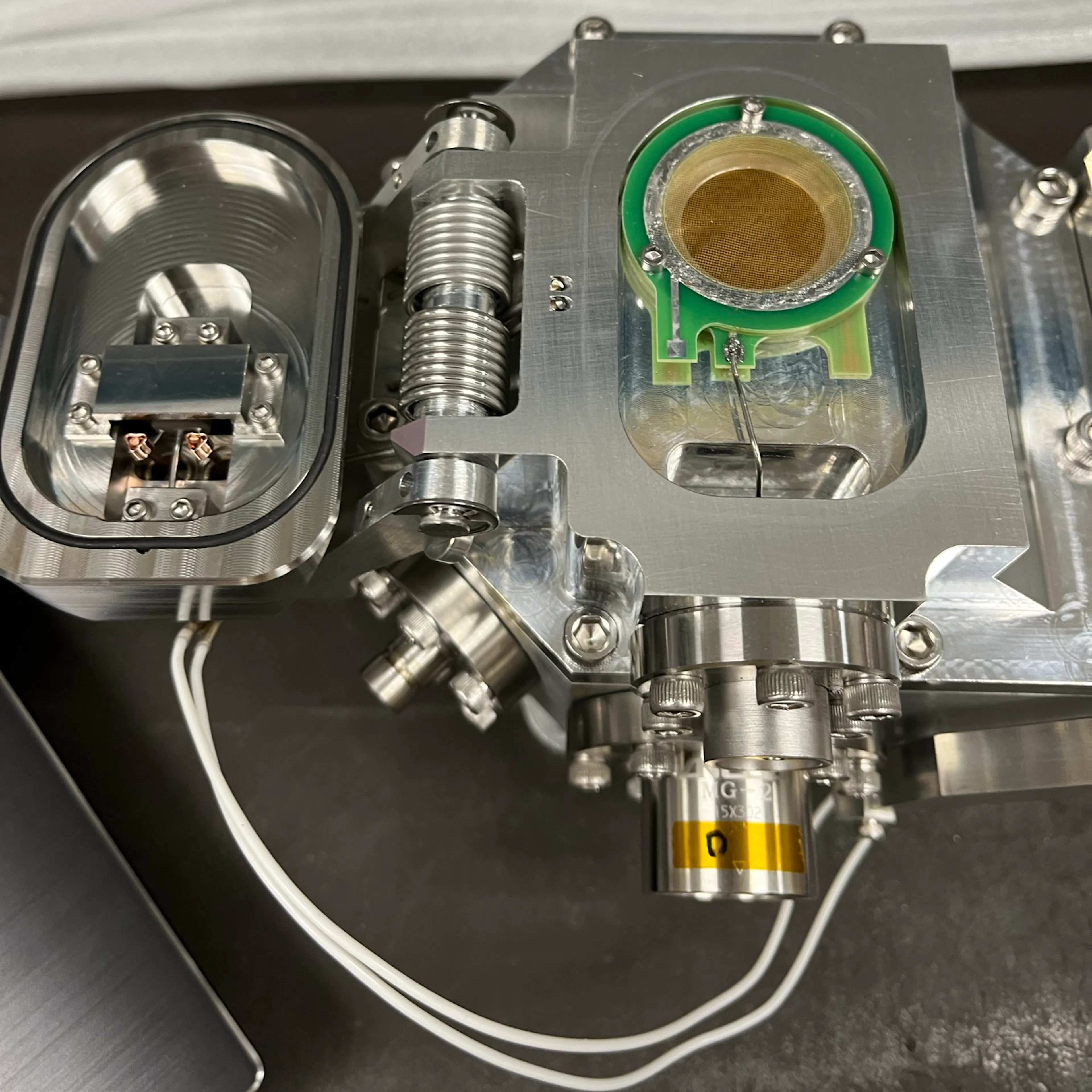 The full instrument in a deployed/open configuration, with the door plate visible on the left (Photo credit: UNH)