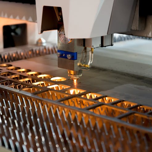 Laser cutting sheet metal. Image Credit: Shutterstock.com/Travelpixs