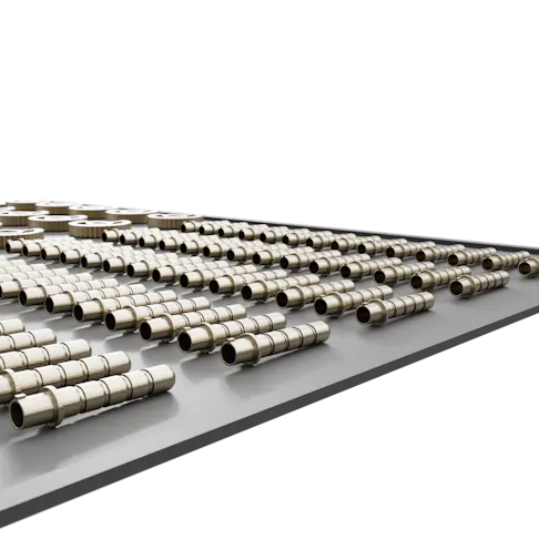Metal injection molded components on a table