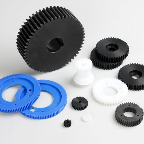 Gears made of engineering plastics. Image Credit: Shutterstock.com/John Kasawa