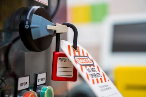 Lockout/tagout on a piece of machinery. Image Credit: theDirector/Shutterstock.com