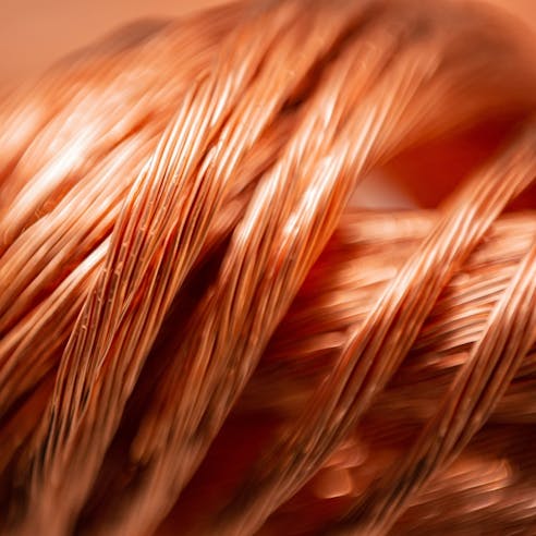 Coil of copper wire. Image Credit: Shutterstock.com/Mila-Shchet-ph