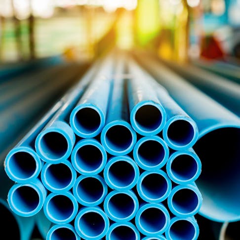 Blue PVC pipes. Image Credit: Shutterstock.com/koonsiri boonnak
