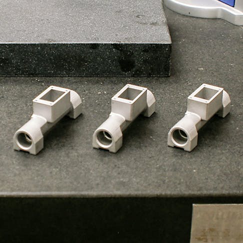 Three aftermarket car parts that are 3D printed