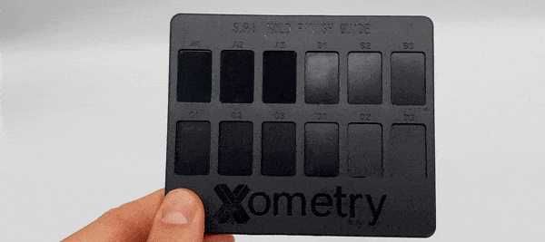 Xometry injection molding finishes card with SPI on the front and VDI 3400 on the back