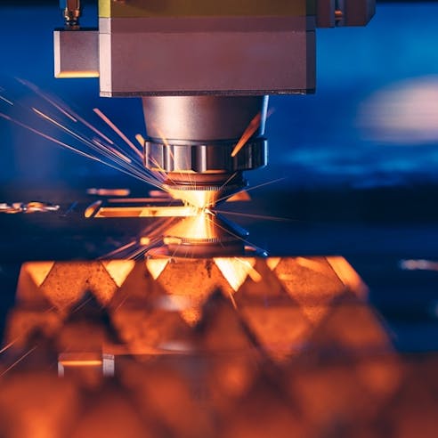 CNC cutting metal. Image Credit: Shutterstock.com/Parilov