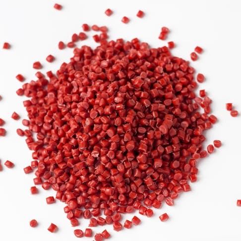 Red granules of polypropylene. Image Credit: Shutterstock.com/Anastasiia Burlutskaia
